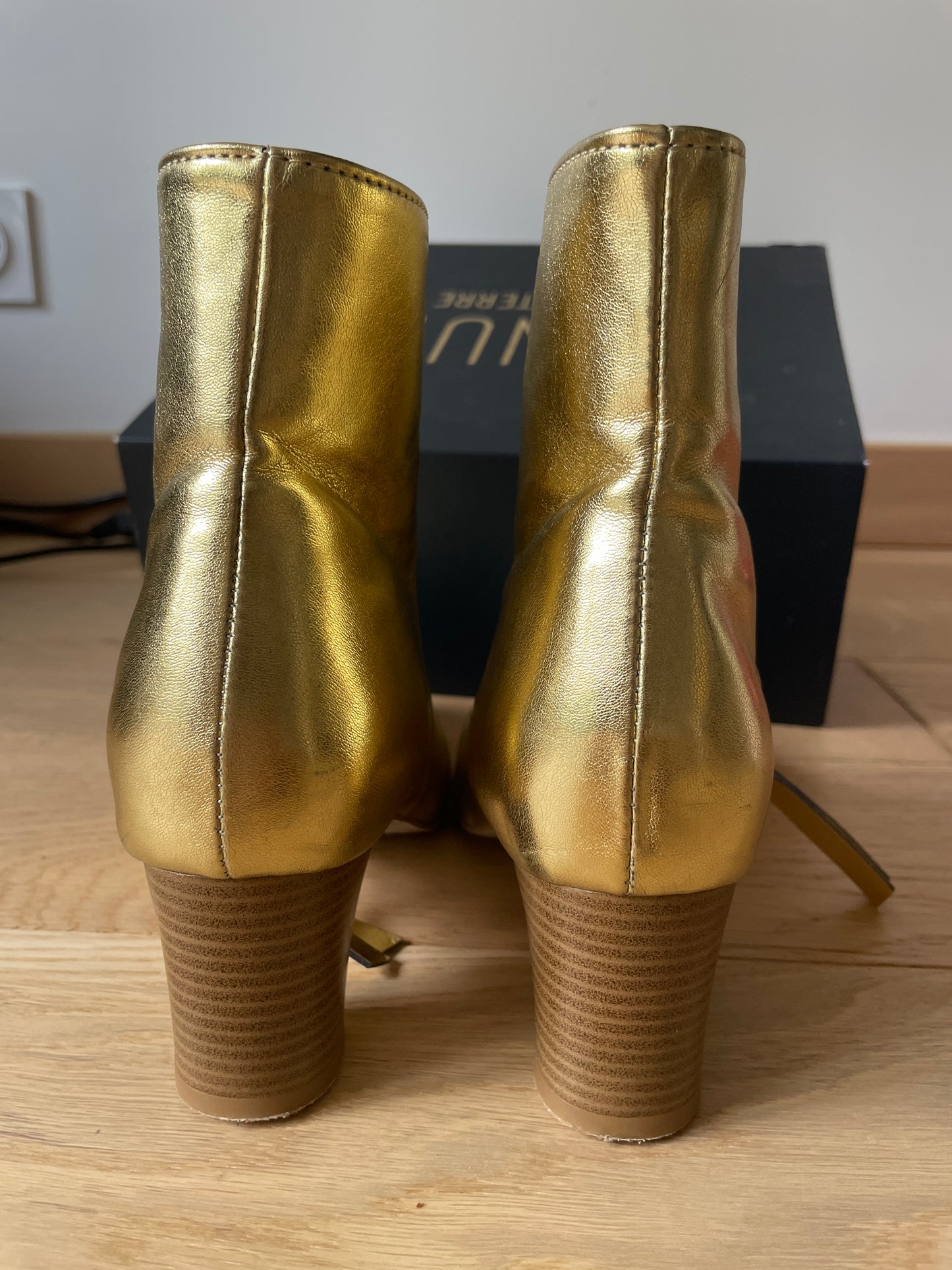 Golden ankle boots