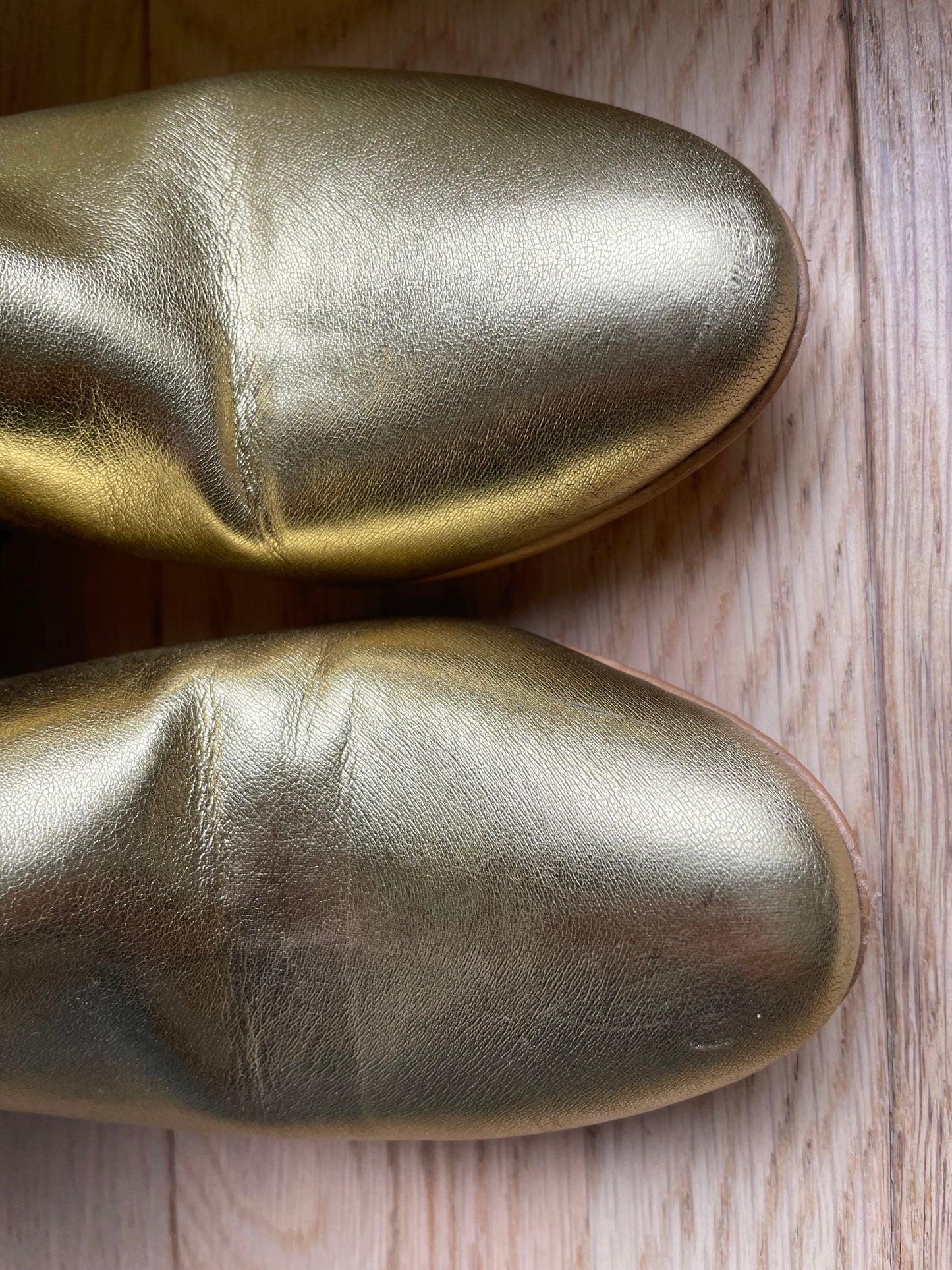 Golden ankle boots