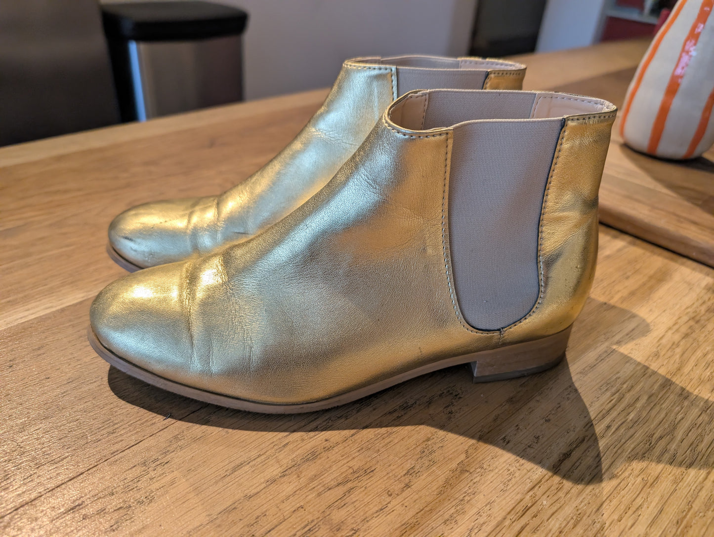 Golden ankle boots