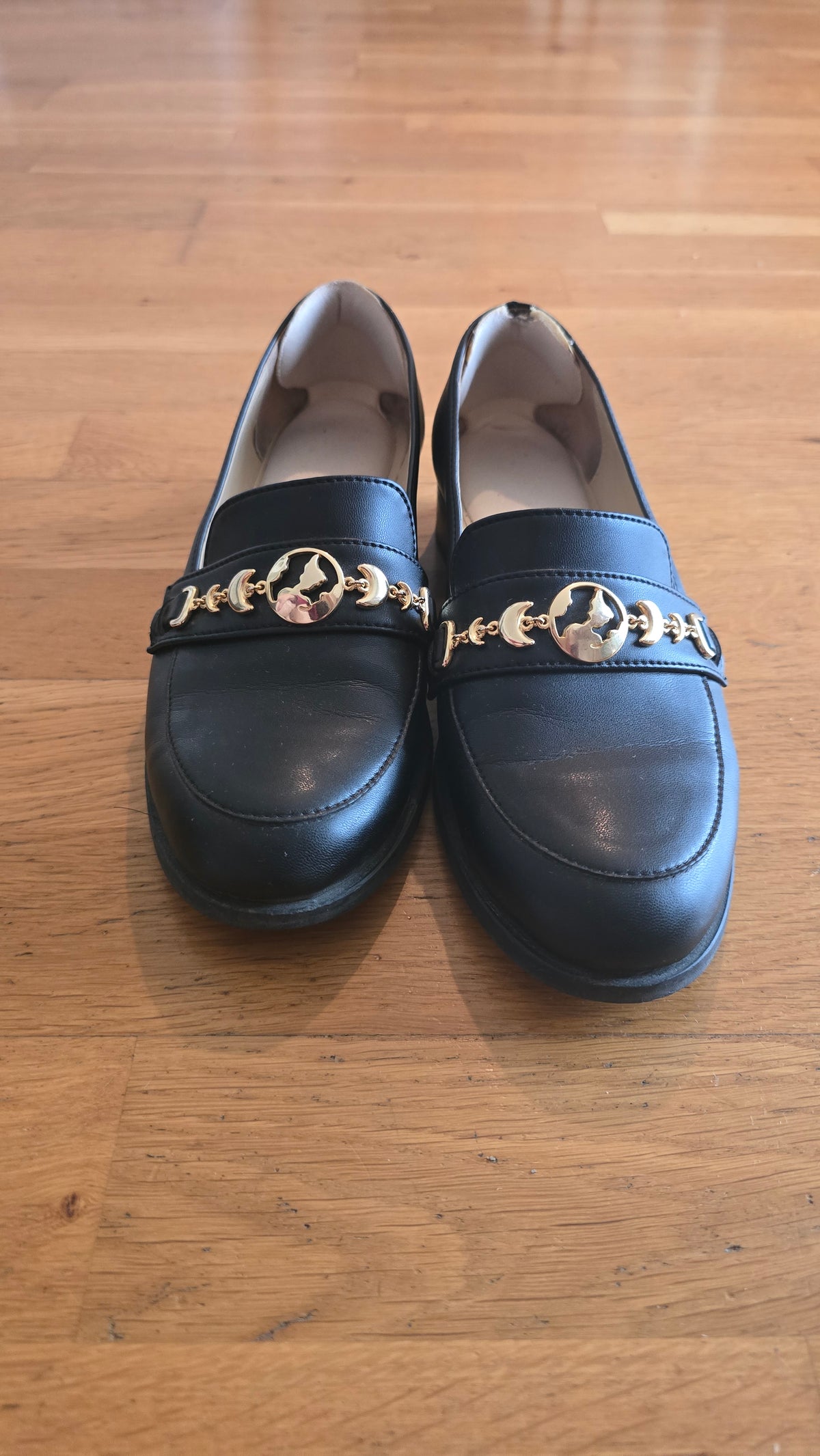Mocassins noirs Symbole doré