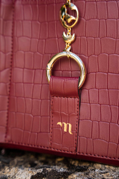 Sac à dos vegan écoresponsable recyclé bordeaux imitation crocodile Falabella Minuit sur Terre